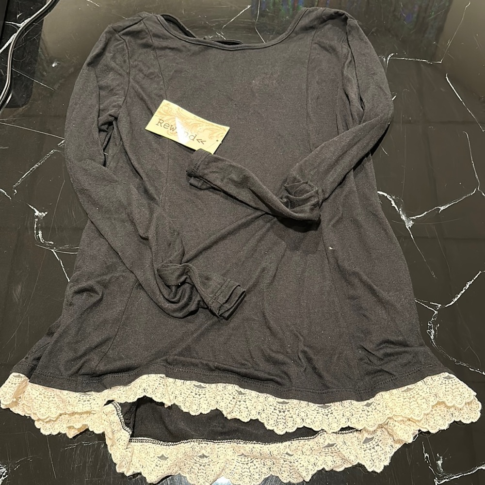 Small brand new super cute black long sleeve blouse with cream lace